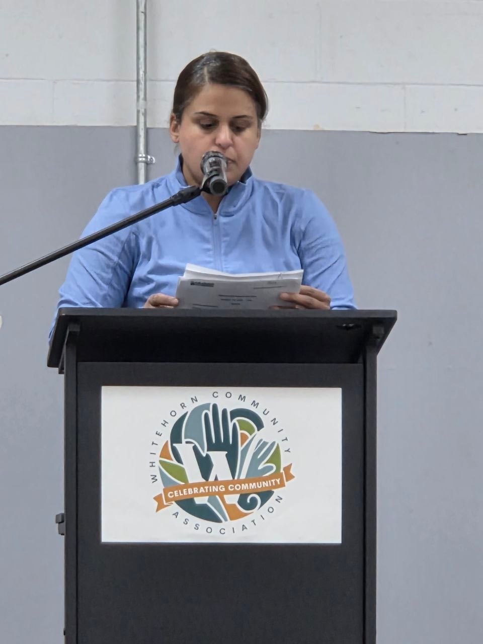 A speaker at the Whitehorn Community Association podium